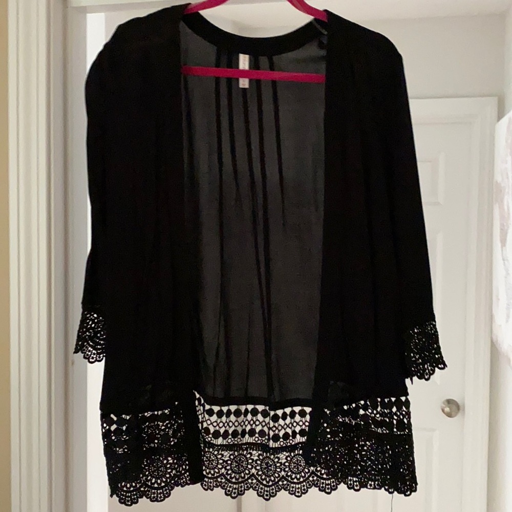 Black sheer cardigan with lace detailing on the sleeves & bottom of cardigan